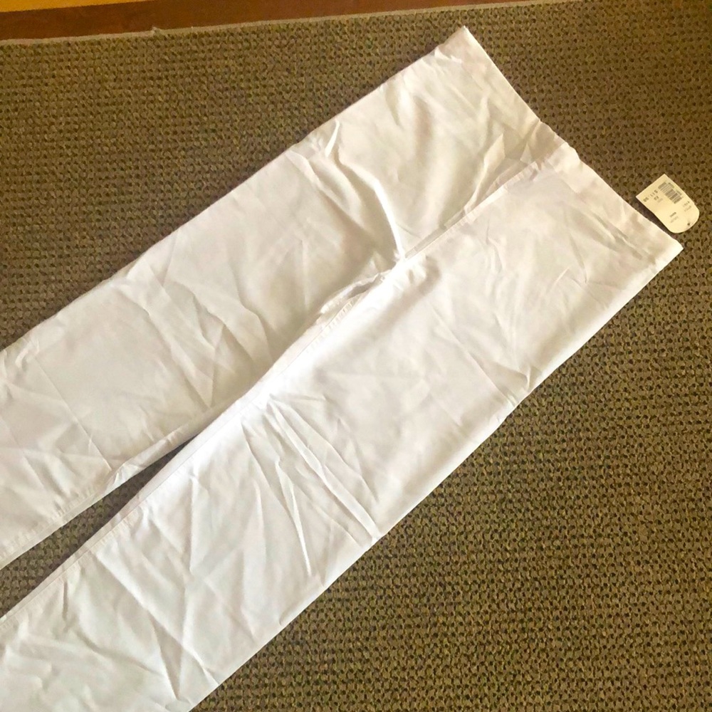 White scrubs extra small brand new with tags.